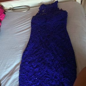 This is a blue lace dress with blue sequence to make it shine.